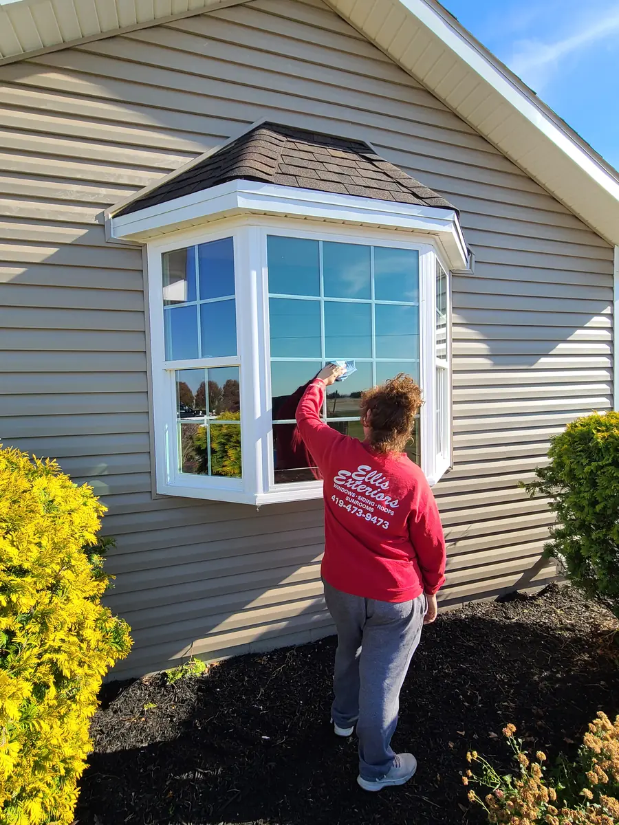 Final cleaning and inspection of a newly installed bay window