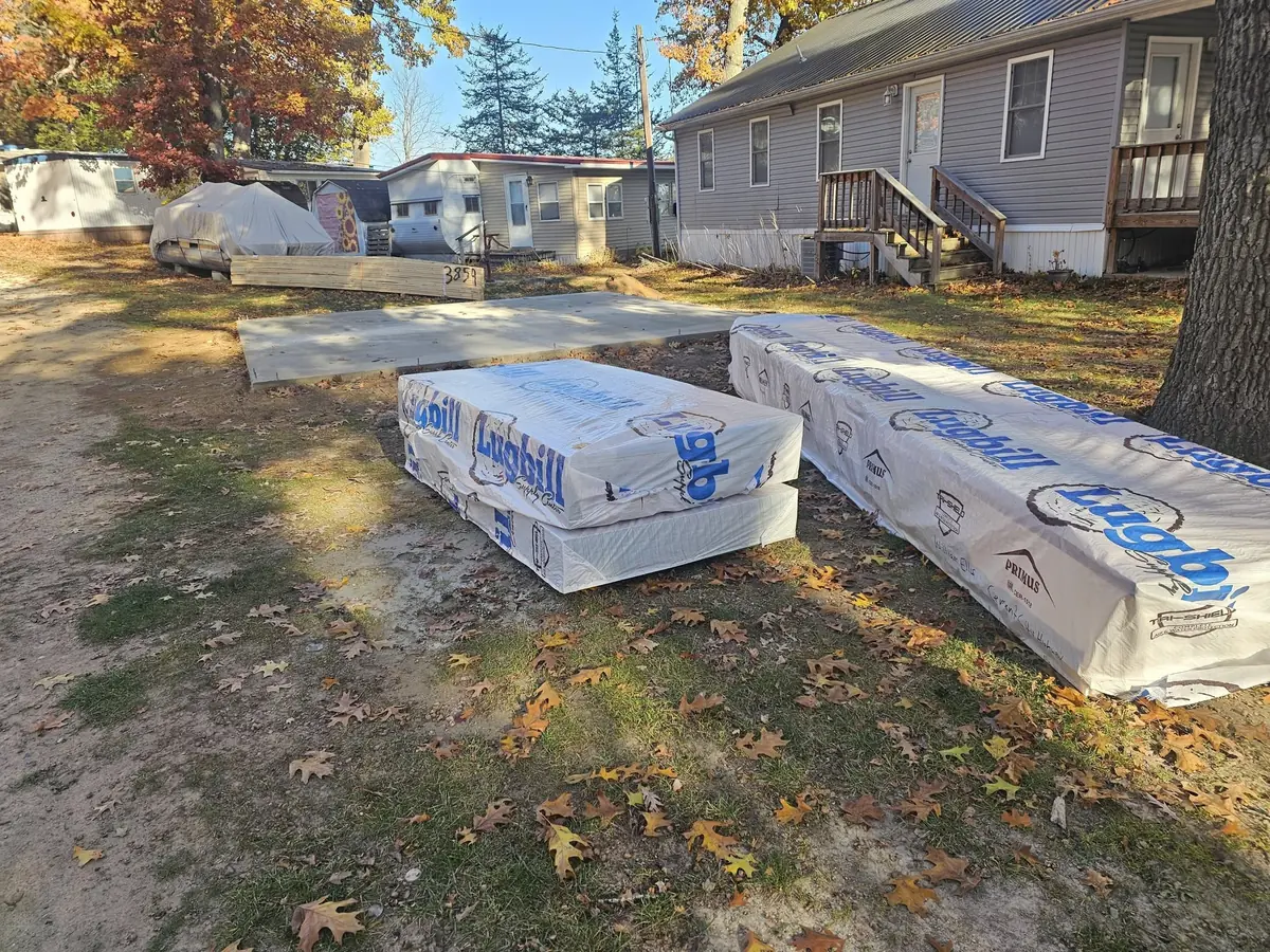 Building materials delivered to a KNU Services residential jobsite