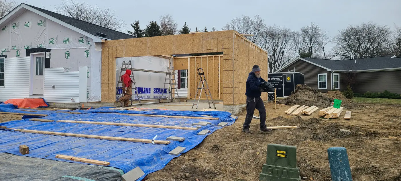 Early foundation and floor preparation for a residential addition